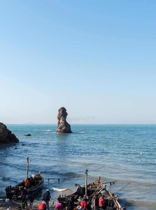 青岛的“富人区”，因一块石头而得名，处处是豪宅