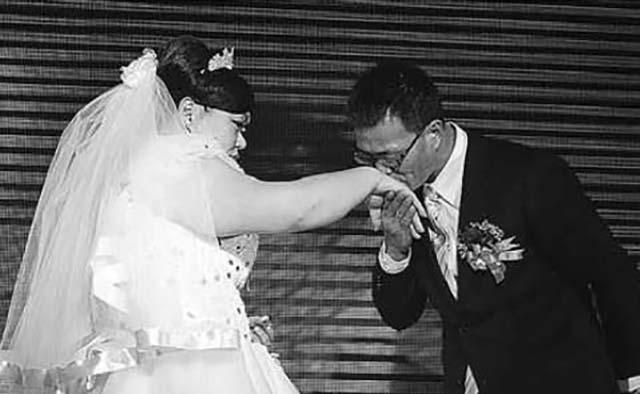 2009年唐功红退役嫁英俊丈夫