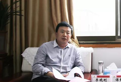 李晓刚会见谭赣明一行