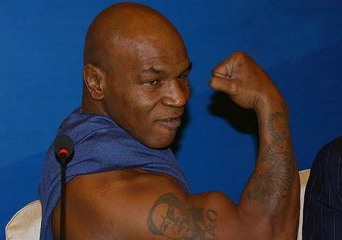 反差太大,泰森10年水桶到猛男!胸肌比脸大,53岁1战吸金1.4亿