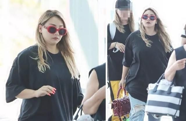 韩星cl李彩琳出现在机场时,因为身材发福引发了一波热议.