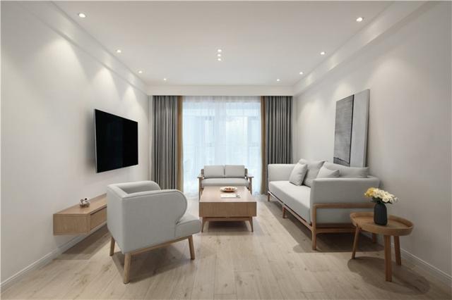 客厅作为两人主要的休闲区域简洁的白墙赋