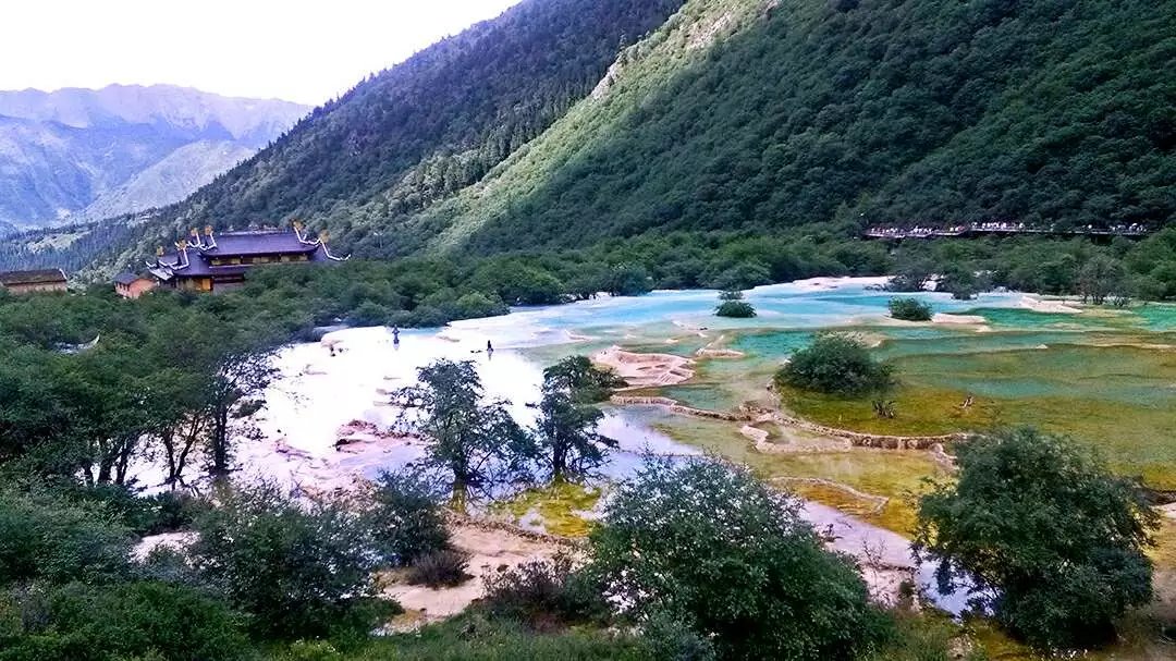 四川黄龙风景名胜区:人间瑶池、浓缩的锦绣中华|黄龙景区|雪宝鼎|黄龙_新浪新闻