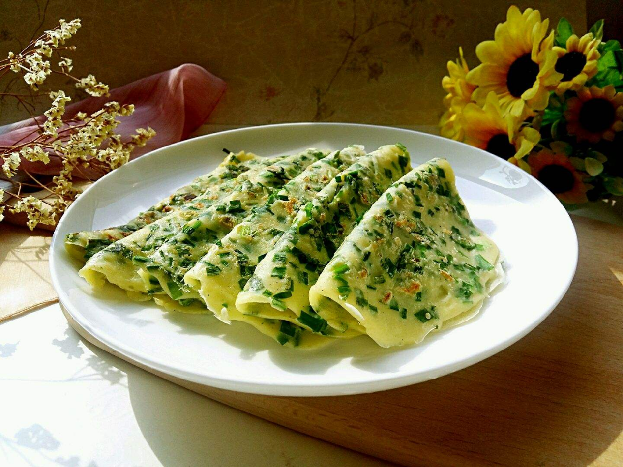 如果是人口比较少,就可以不用那么辛苦,哈哈,可以做个韭菜鸡蛋饼,来杯