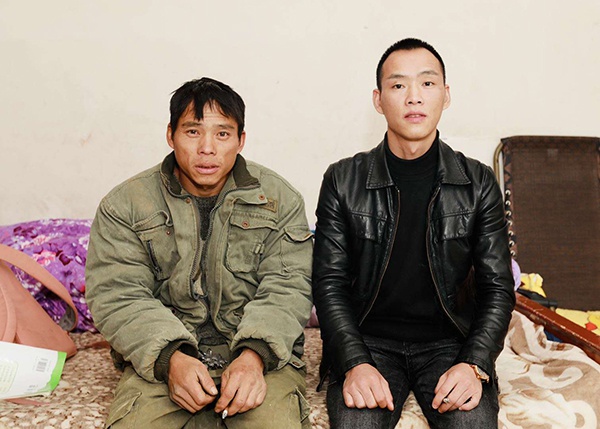 精干的向明钱和内向迟钝的哥哥 受访者 供图