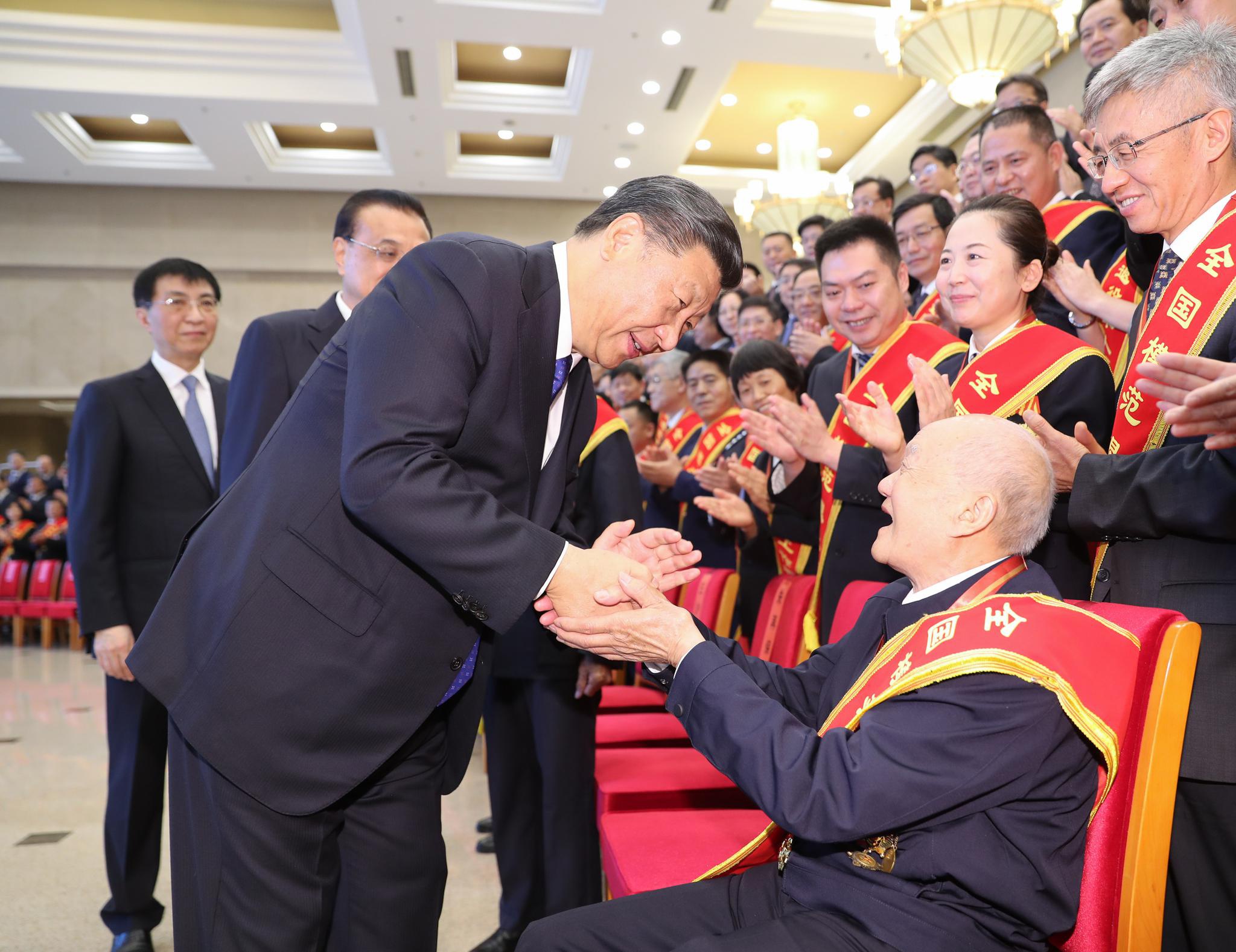 2019年7月26日，习近平总书记在北京会见全国退役军人工作会议全体代表。