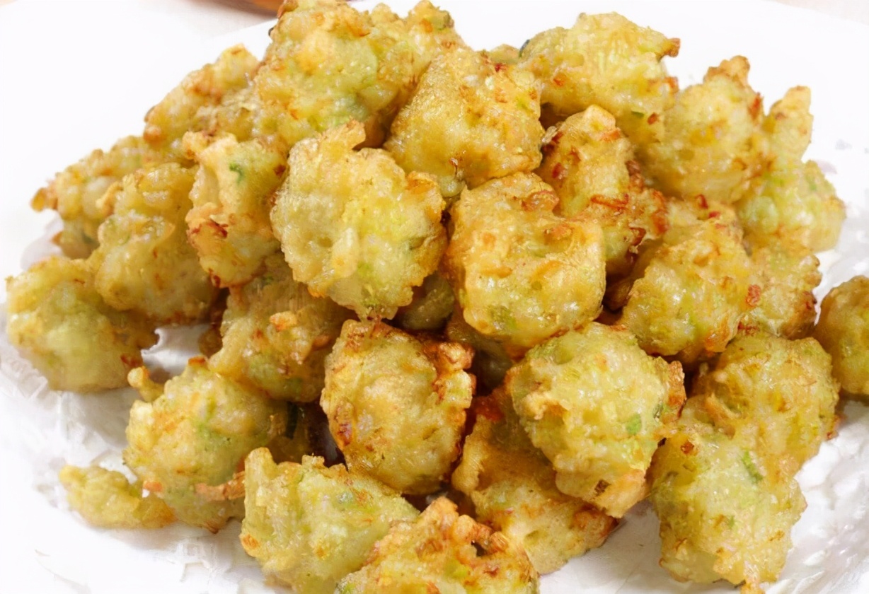 炸萝卜丸子,别再加淀粉,加上这2样就够了,丸子蓬松酥脆,好吃