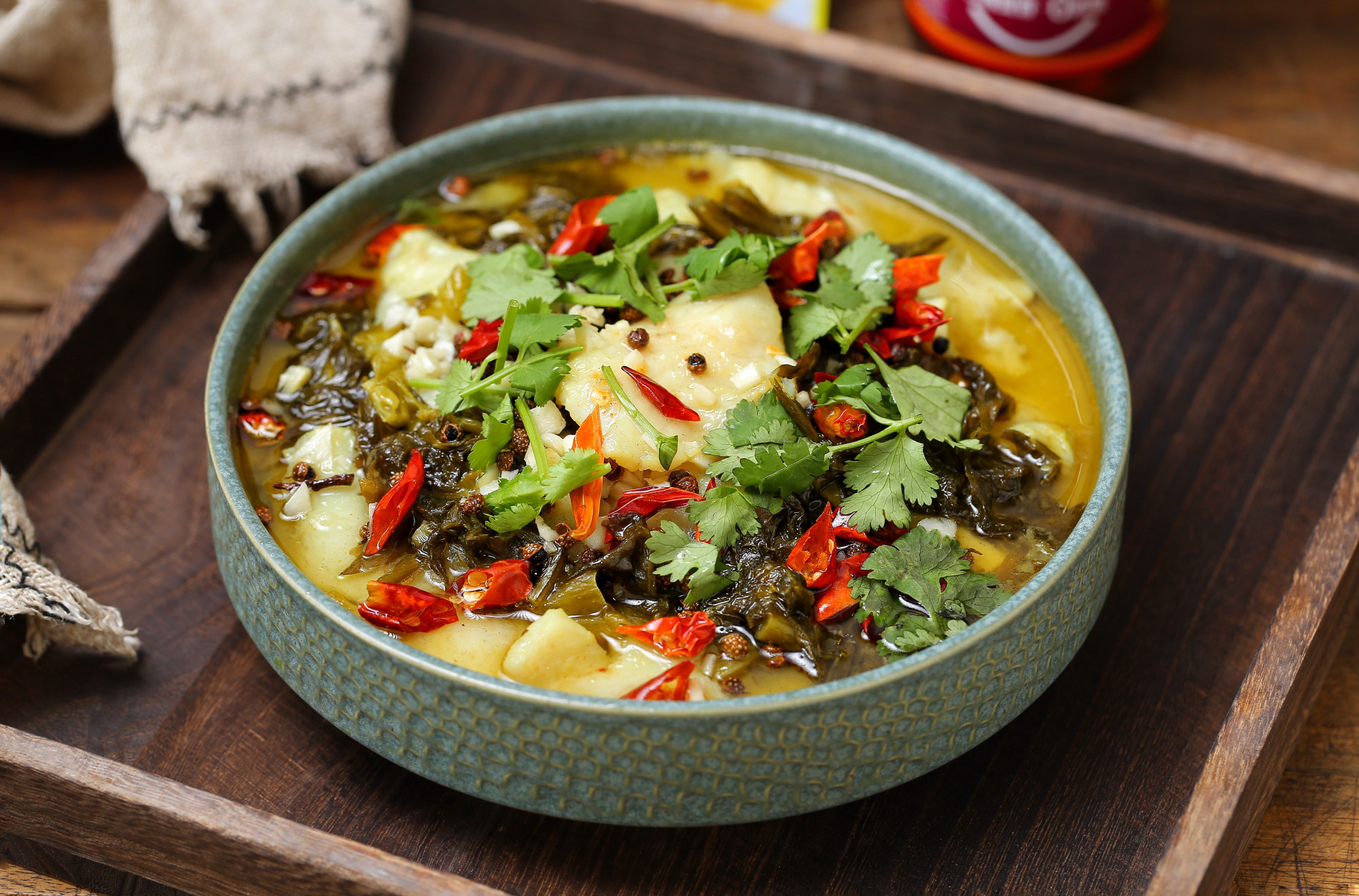 11.一道酸辣开胃的金汤老坛酸菜鱼就做好了,米饭要多准备一些哟!