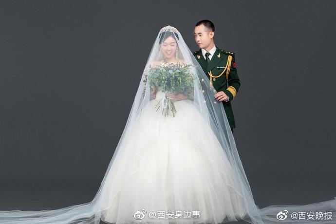 那对因疫情推迟婚礼的军人情侣拍婚纱照了休闲区蓝鸢梦想 - Www.slyday.coM 那对因疫情推迟婚礼的军人情侣拍婚纱照了休闲区蓝鸢梦想 - Www.slyday.coM