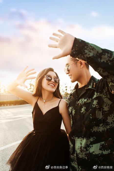 那对因疫情推迟婚礼的军人情侣拍婚纱照了休闲区蓝鸢梦想 - Www.slyday.coM 那对因疫情推迟婚礼的军人情侣拍婚纱照了休闲区蓝鸢梦想 - Www.slyday.coM