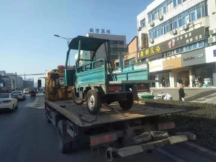 拖移三轮车5辆,汽车4辆