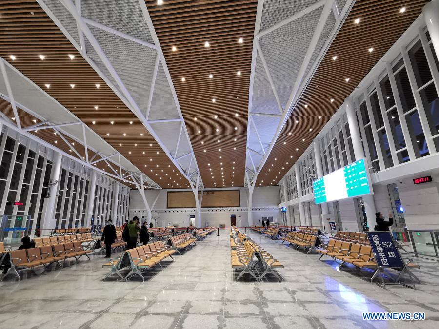 Phone photo taken on Dec. 1, 2020 shows an interior view of the new station building of the Yanqing Railway Station in Yanqing District of Beijing, capital of China. The Yanqing line, one of the major transport infrastructure projects for the 2022 Beijing Winter Olympics, was officially put to operation along with the new station building of the Yanqing Railway Station on Tuesday. The 9.33-kilometer line with a designed speed of 160 kilometers per hour provides a much faster connection between Yanqing and downtown Beijing. (Xinhua)