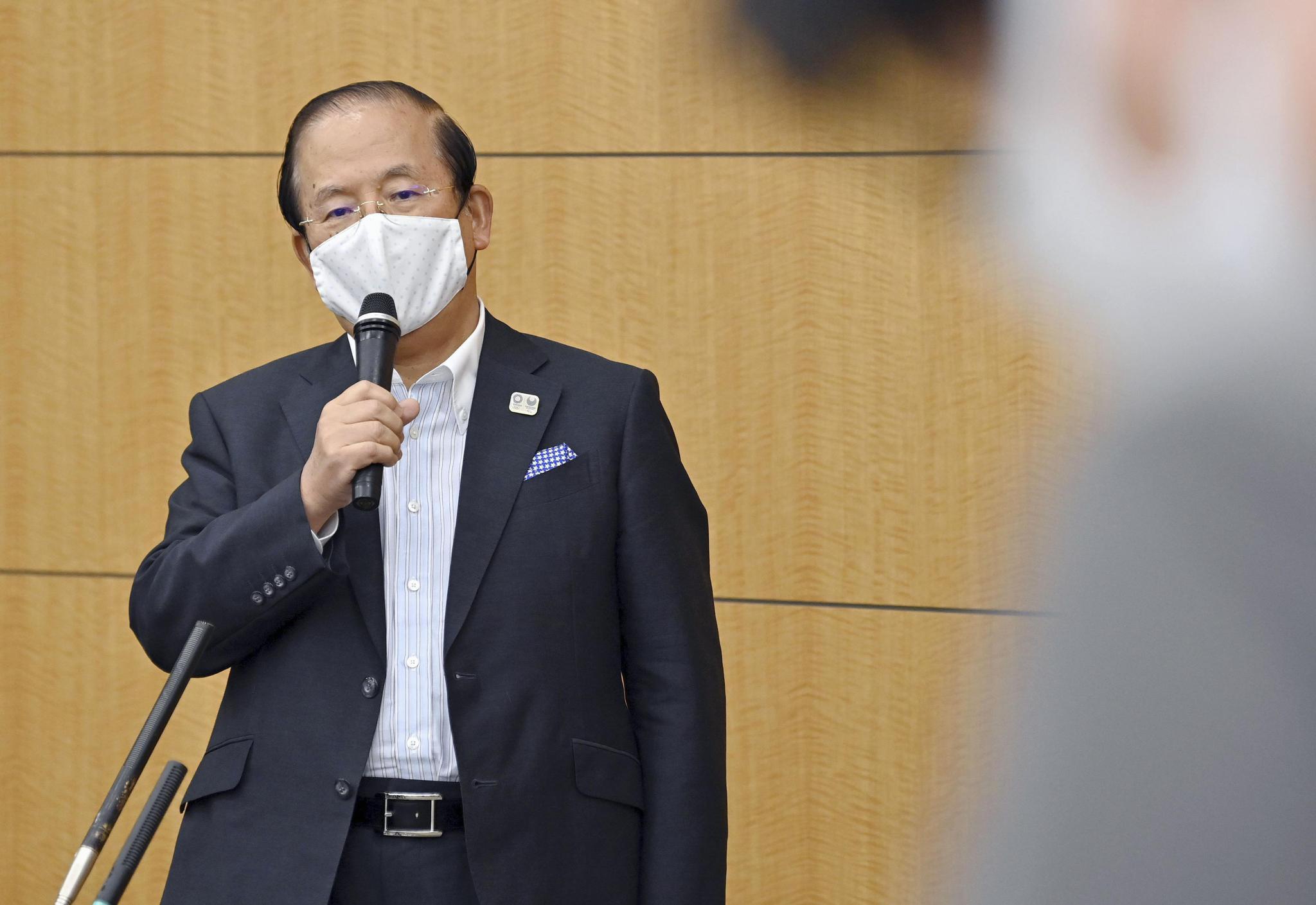 9月4日,东京奥组委首席执行官武藤敏郎会后向记者介绍情况.