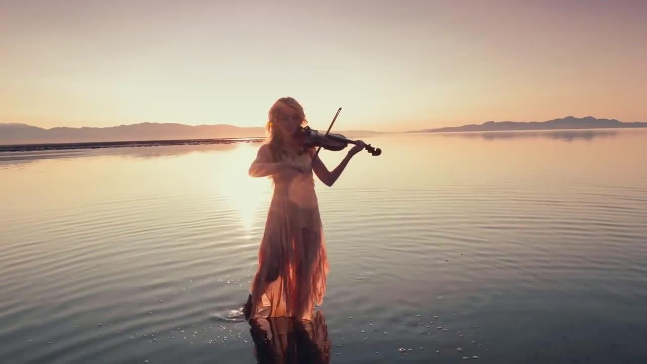 小提琴,落日的光 浅浅的湖水和轻盈的舞步 活脱脱遇见了生活