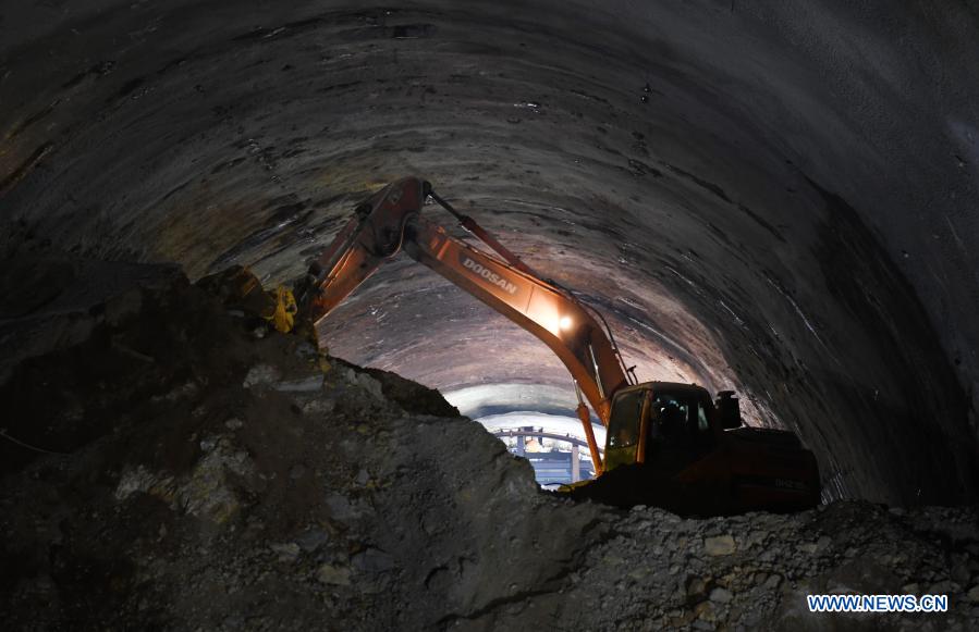 Photo taken on Dec. 22, 2020 shows the construction site of Tunnel Dajin No.1 of the Huanggang-Huangmei high-speed railway in Huanggang, central China's Hubei Province. The 605-meter-long Tunnel Dajin No.1 was successfully drilled through on Tuesday. So far, all the 15 tunnels along the Huanggang-Huangmei high-speed railway have been holed through. The 125.12-km Huanggang-Huangmei high-speed railway in Hubei Province is designed to run at a speed of 350 km per hour. (Xinhua/Cheng Min)