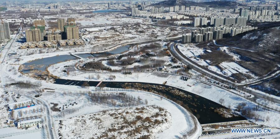 Aerial photo taken on Dec. 30, 2020 shows the snow scenery of the Daixi river scenic spot in Zouping City, east China's Shandong Province. (Photo by Dong Naide/Xinhua)