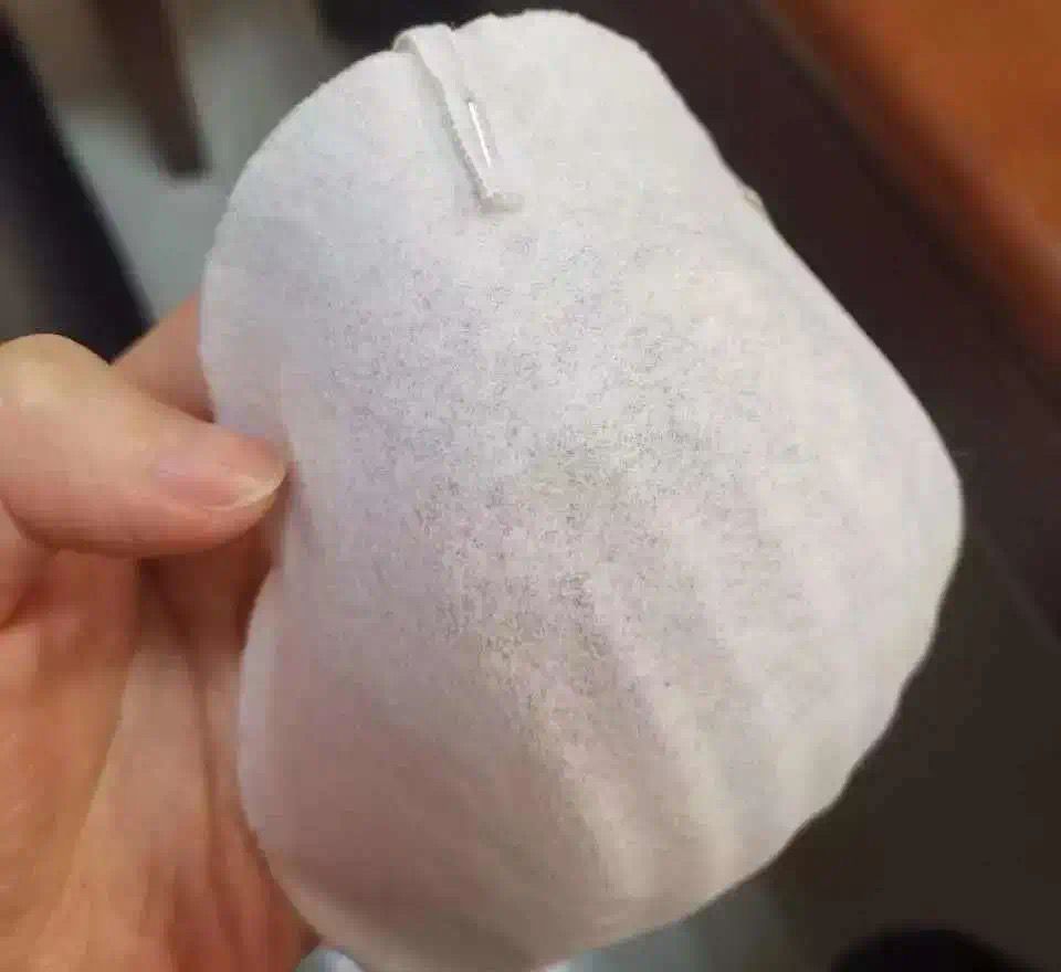 涉案不同格口罩。法院供图