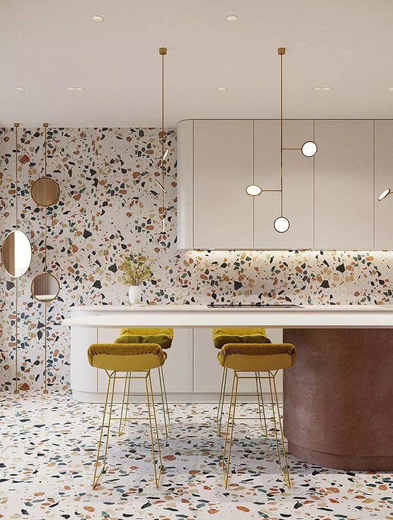 使空间更为连贯一致,加入水磨石的彩色元素,整体效果变得活泼有趣