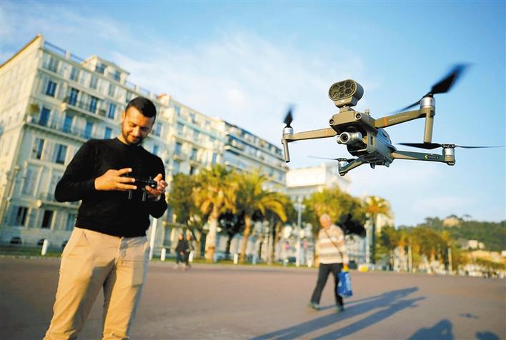 喊话,测温,运货,遛狗……大疆无人机海外战疫姿势多