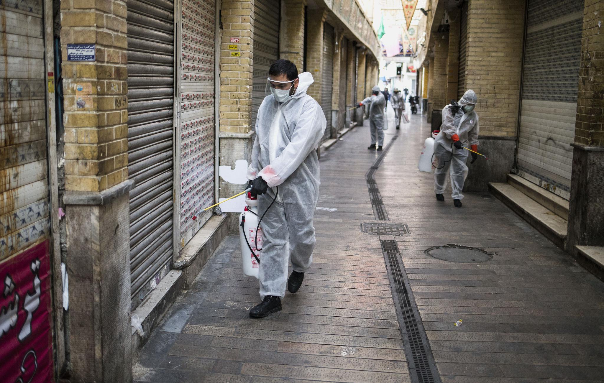 伊朗:消毒进行时|志愿者|新冠肺炎_新浪新闻
