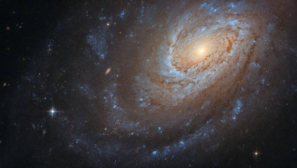 美丽的螺旋星系。（图片来源：ESA/Hubble & NASA）