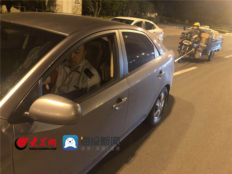 深夜电动三轮“罢工” 青岛公交“另类顺风车”20公里拖回