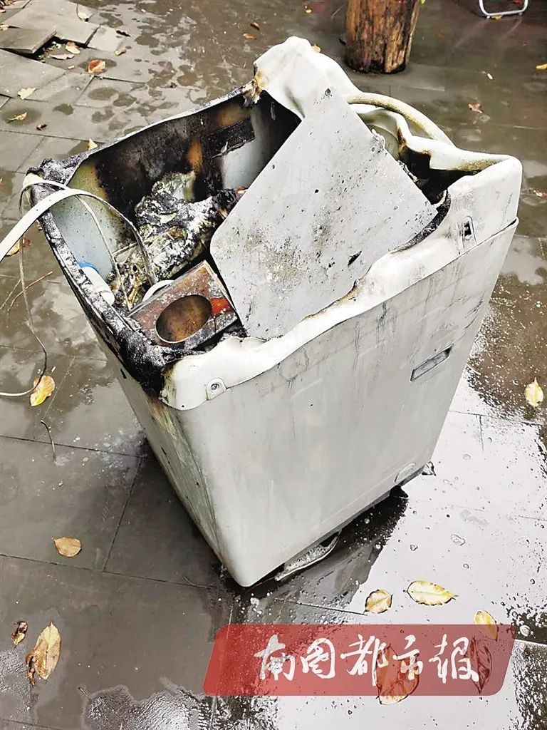 海口一市民家中洗衣机转着转着烧起来,财物受损,商家赔偿新机和2万元