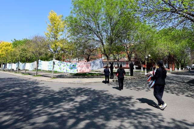 “云接单”帮学生晒被子、浇花 山东科技大学宿管阿姨太暖了