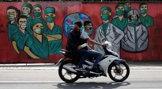 新冠肺炎疫情中的印度尼西亚街头。图源：路透社