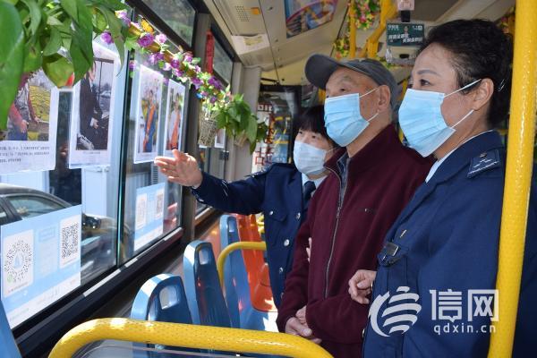 青岛九旬乘客办起车厢摄影展 记录劳模工作点滴