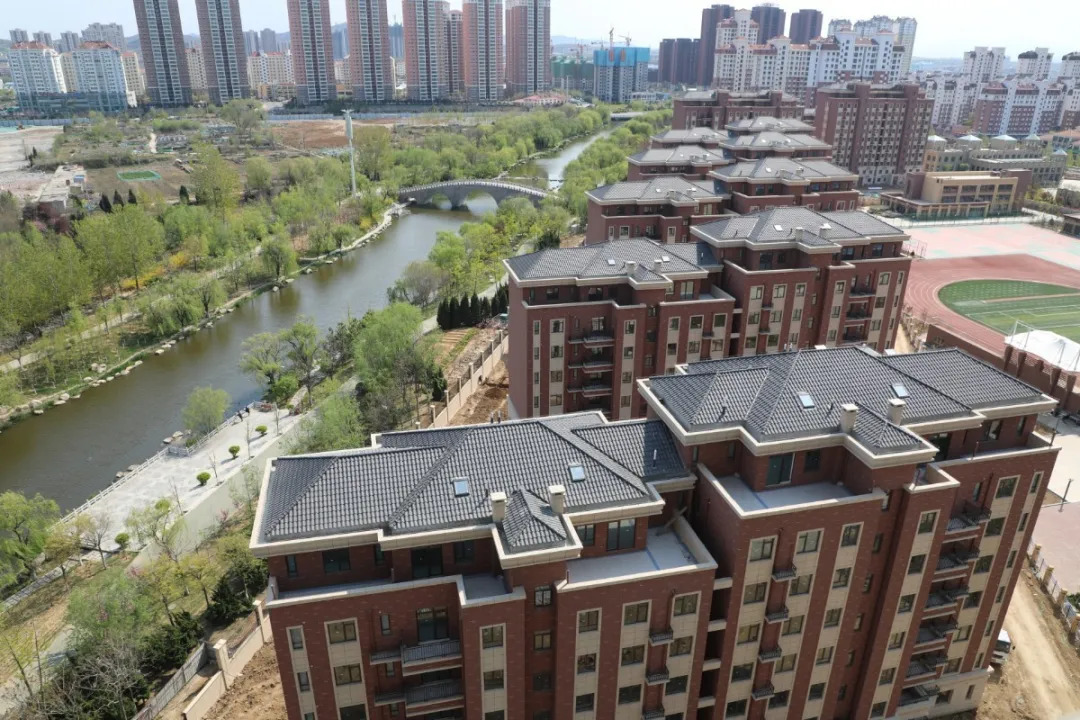 莱山区鲁商公馆项目快速推进,安置区8栋回迁楼完成主体封