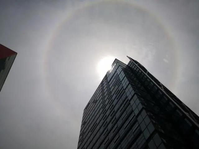 杭州天空上出现神奇一幕,你看到了吗?明天雨水送凉,后天气温再变