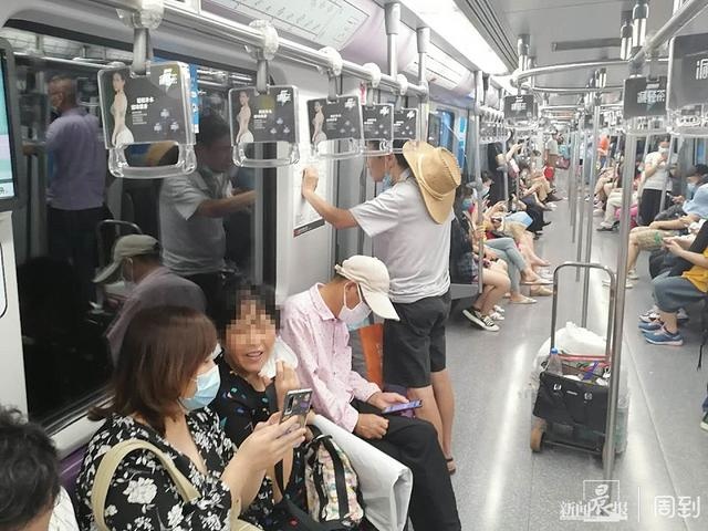 高温天,上海地铁车站加大频率提示"全程戴口罩"