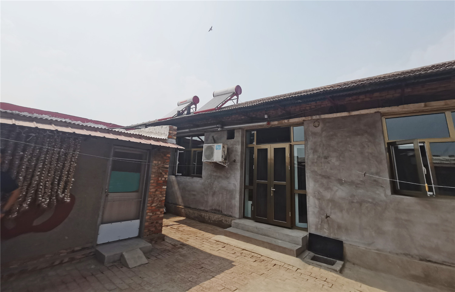 在保证房屋安全,实现住房基本功能的基础上,天津市在农村危房改造过程