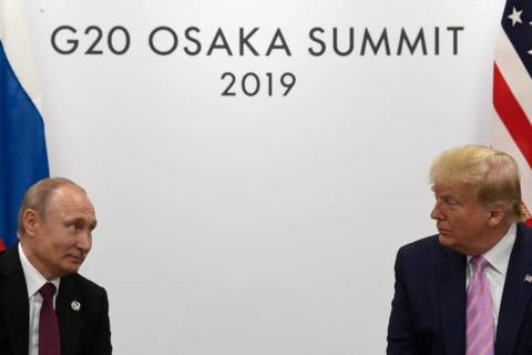 2019年6月28日，俄罗斯总统普京与美国总统特朗普在20国集团峰会期间举行会晤。（图源：美联社）