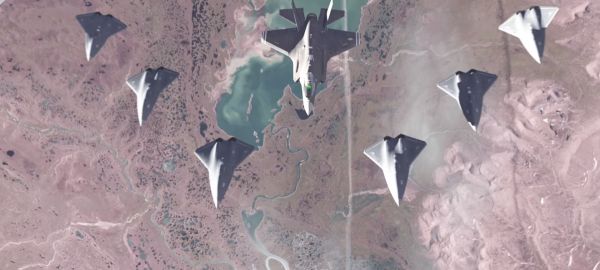 美军F-35隐身战机遥控无人机群作战想象图。（图片来源于网络）