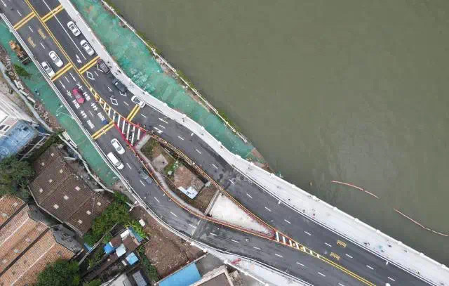 广州“桥中房”引争议 专家：应反思拆迁工作是否做到位