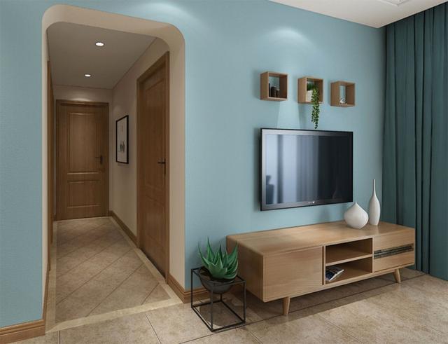 简洁的半圆弧形门洞过道设计,提升了整个起居室设计的品味,又对室 