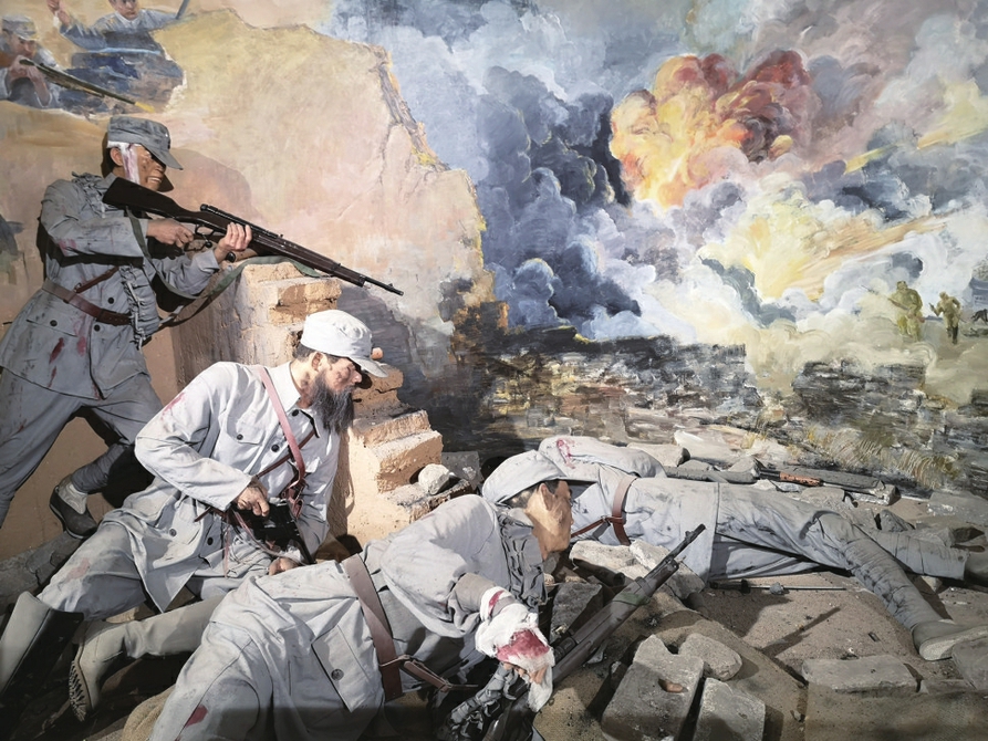 在范筑先烈士纪念馆展厅,用现代技术还原的聊城保卫战激战场景.