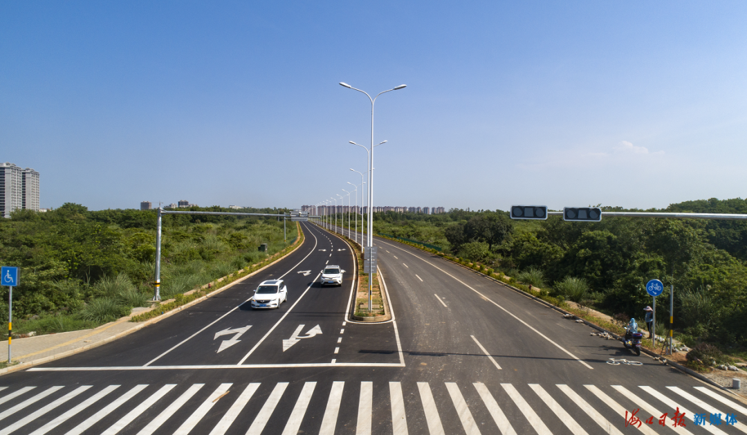 海口羊山大道一期主干道南段通车双向6车道全长5058米