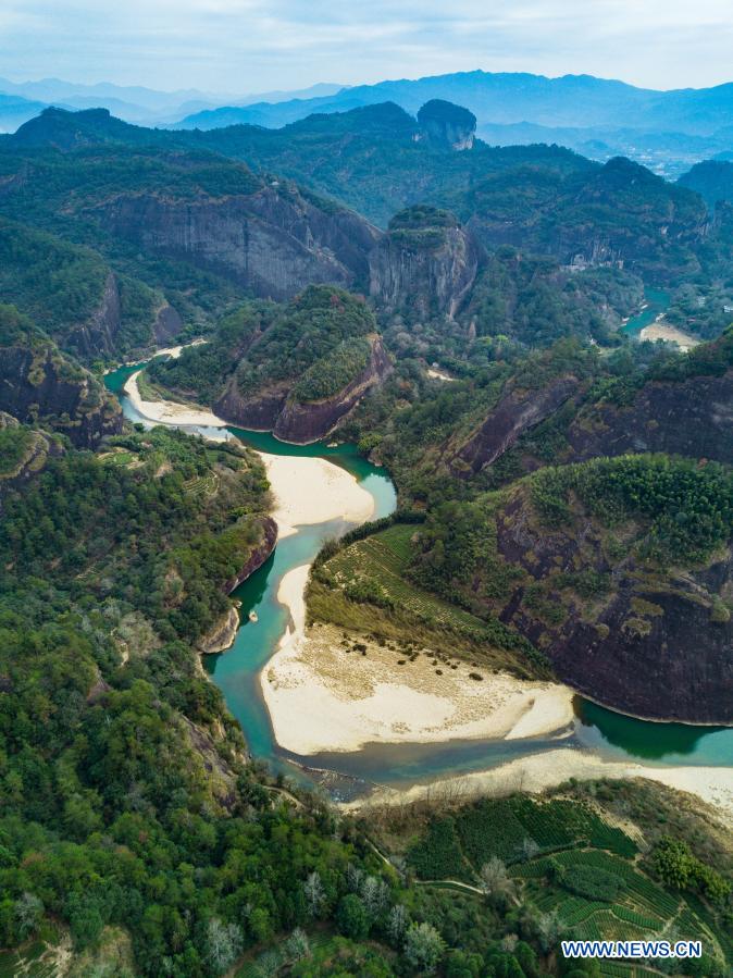 Aerial photo taken on Jan. 3, 2021 shows the scenery of the Jiuqu Stream in Wuyi Mountain, southeast China's Fujian Province. (Xinhua/Song Weiwei)