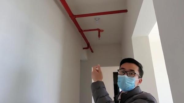 昆明一新交房楼盘室内层高缩水半米 消防喷淋触手可及