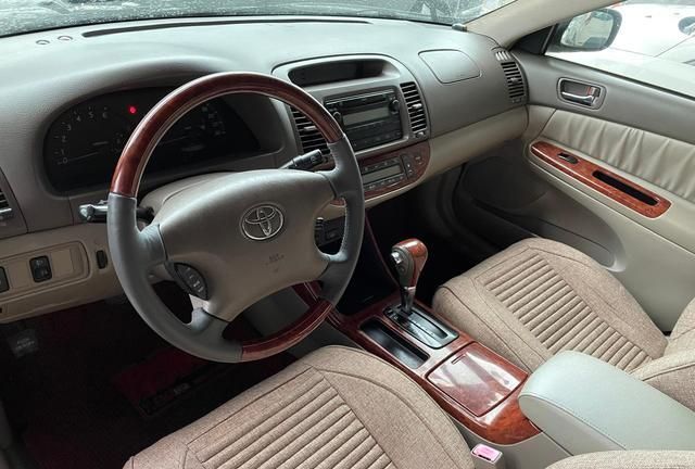 花两万块钱买一台04年的进口佳美,发动机真好一把就着!