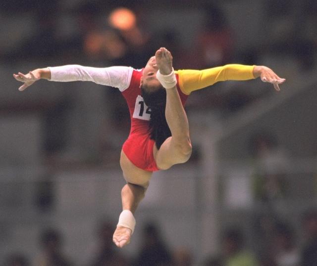 莫慧兰除了是"世界体操最美冠军"外,同时她还是"莫氏空翻"的开创者