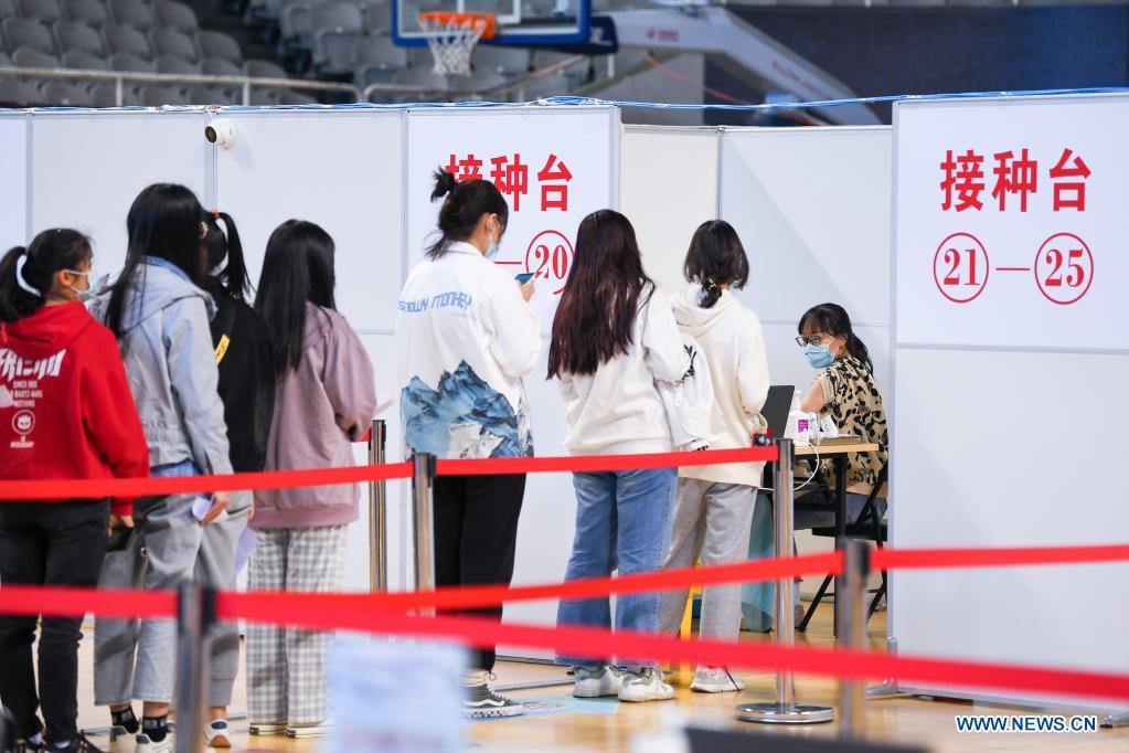 People queue to receive COVID-19 vaccine at a vaccination site in Gulou District of Nanjing, east China's Jiangsu Province, April 9, 2021. East China's Jiangsu Province has launched a mass vaccination campaign against COVID-19. (Xinhua/Li Bo)