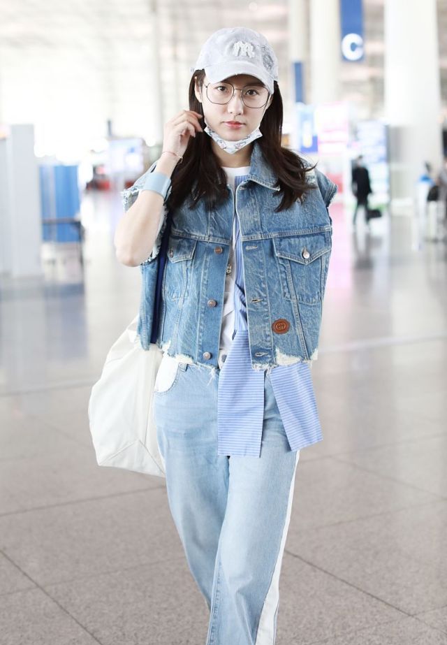 吕一罕见获老公接机穿衣默契却无交流钱泳辰拖行李全程高冷