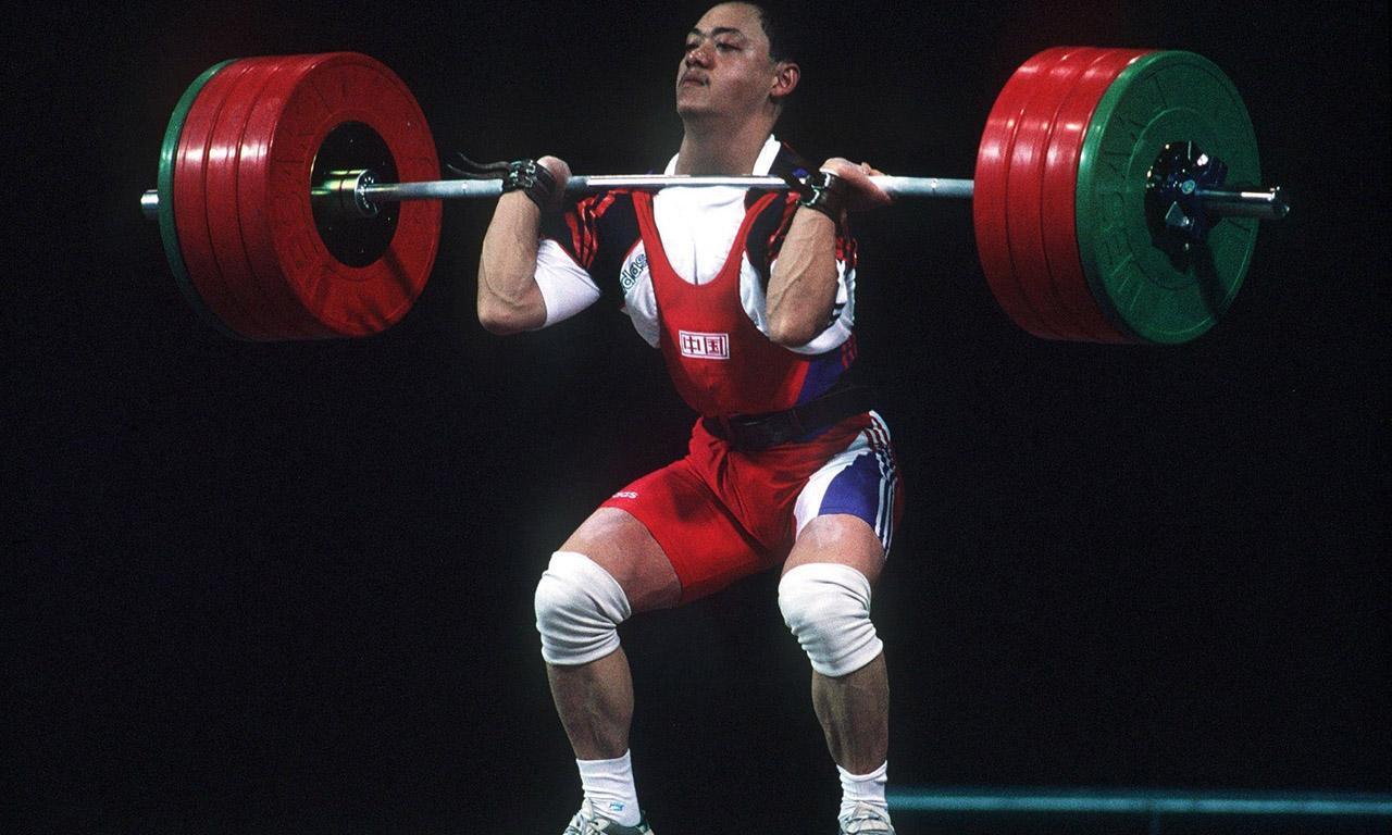 46岁举重冠军占旭刚,娶空姐为妻,如今任校长培养无数人才