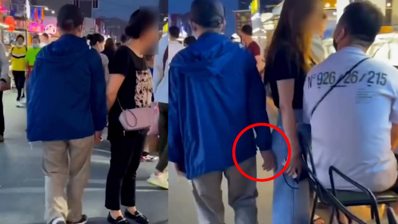 实拍老大爷夜市一路摸女性屁股