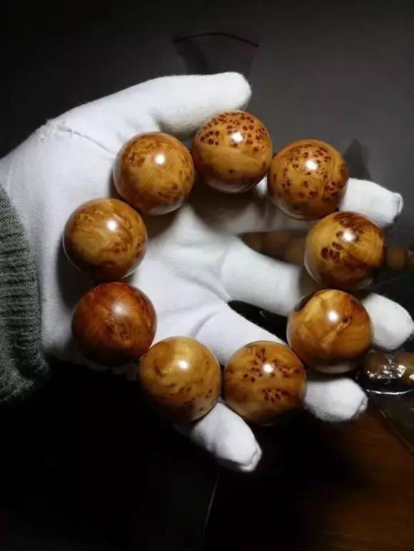 瞧瞧人家这包浆这才是盘木串的最牛境界