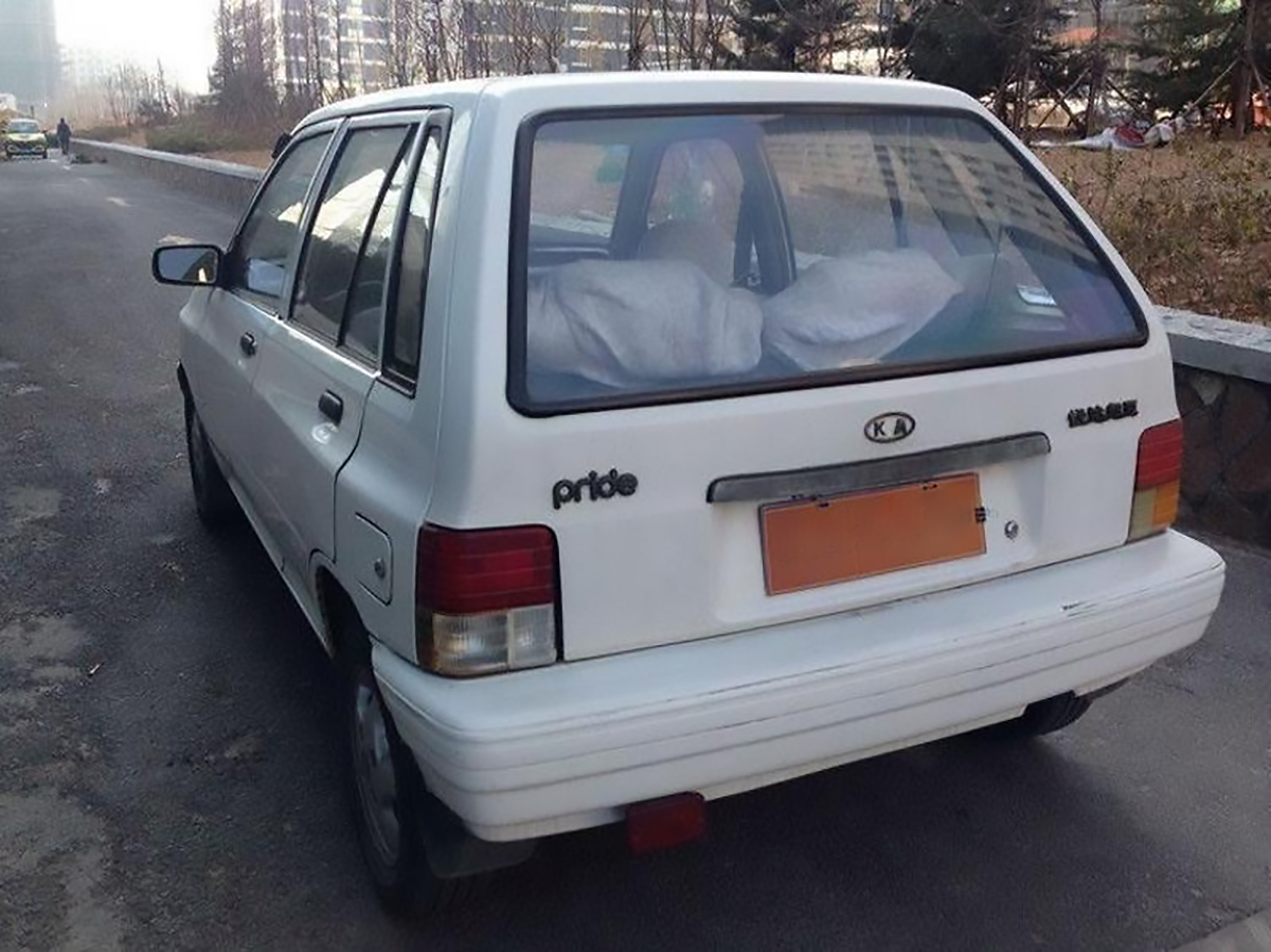 起亚普莱特是2001年引进的,那个时候东风还没进入合资公司,当时是由